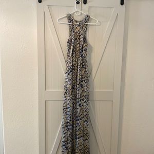 Floor length silk dress with fun back detail